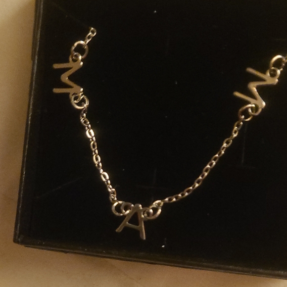 Jewelry - Silver Initial Necklace Says "Mama'